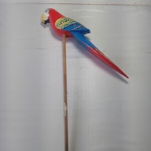 Wooden parrot with stick